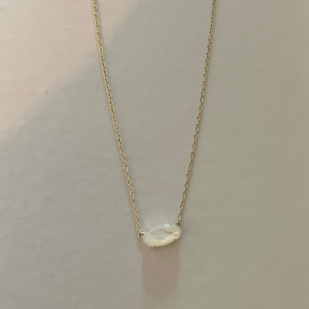Kendra Scott Gold and White Necklace with Minimalist Design
